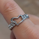 Bague Belo cœur ajouré argentée portée à la main - bague réglable acier inoxydable
