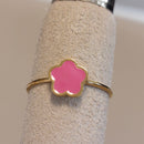 Bague réglable Natal fleur rose vue de face - acier inoxydable doré

