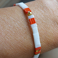 bracelet taille élastique en perles de couleurs blanches rouilles et dorées pas chers sur Marignane