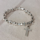 Bracelet élastiqué constitué de perles aciers en forme de petites croix templières et fini par une pampille aussi en forme de croix sur aix en provence