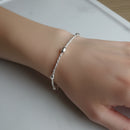 Bracelet Bangalore argent 925 maille torsadée porté au poignet - bijou femme raffiné