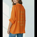 Dos chemise Cosma orange inscriptions dorées villes mythiques voile coton - ineva