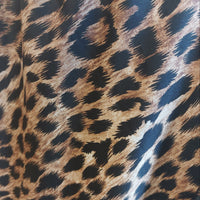 Jupe Miss.L détail imprimé léopard camel matière satinée fluide. Detail motif Jupe Miss.L camel