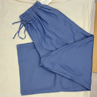 Pantalon Jordan jean foncé – vue a plat sur tailla élastiquée et cordon de serrage, coupe palazzo taille unique 36-44
