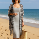 Paréo poncho filet léopard irisé Celéo argent porté avec franges - ineva
 sur carry le rouet