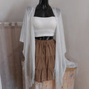 Paréo poncho plage Celia filet irisé blanc avec franges - ineva