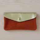 Portefeuille Tomarbi bi-matière coloris brique - Nubuck et cuir doré