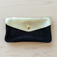 Portefeuille Tomarbi bi-matière coloris noir - Nubuck et cuir doré