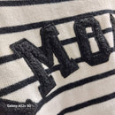 Détail de la broderie bouclette AMOUR sur le pull Popeye coloris écru