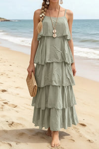 Robe longue June kaki portée pieds nus sur le sable — voile coton volants superposés bretelles fines réglables — look bohème chic été — ineva
