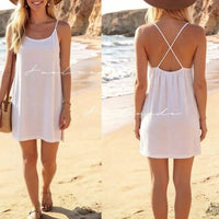Robe Romy blanche portée – courte unie bretelles croisées dos, infroissable, idéale cérémonie