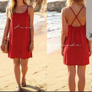 Robe Romy rouge portée – courte unie bretelles croisées dos, infroissable, taille unique 36-44