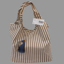 Sac Lacanau grand cabas toile de jute arrondi – vue de face, fermeture éclair et pompons