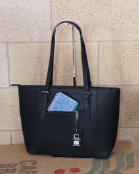 Sac Lecce simili cuir grainé noir vue de dos — 1 poche zip extérieure, anses longues réglables, quincaillerie argentée — ineva
