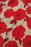 Détail imprimé fleurs graphiques oversize rouge fond blanc du Top caraco Dala — viscose fluide, Made in Italy — ineva
