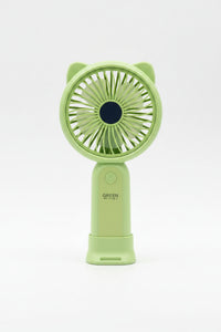 Ventilateur portable Ventilochat coloris Vert amande posé sur son support — oreilles de chat, rechargeable USB-C

