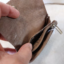 Vue de dessus du portefeuille SAFI ouvert présentant l'organisation des compartiments