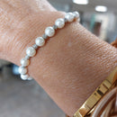 Bracelet Modo – Perles Nacrées Blanches & Boules Acier Élastique